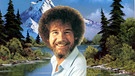 Bob Ross vor einem seiner Landschaftsbilder. | Bild: Bob Ross Company/BR