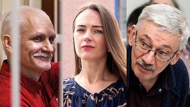 Der Friedensnobelpreis 2022 geht zu gleichen Teilen an den Rechtsanwalt Ales Bjaljazki (Belarus, links im Bild), die Menschenrechtsorganisationen Memorial (Russland) und Center for Civil Liberties (CCL, Ukraine) für ihren Kampf für Bürgerrechte in ihren Heimatländern. Die Vorsitzende des CCL, Olexandra Matwijtschuk (in der Mitte des Bildes), hat am 29. September bereits den Alternativen Nobelpreis 2022 erhalten. Rechts im Bild ist Oleg Orlow zu sehen, der Leiter der russischen Menschenrechtsorganisation "Memorial". | Bild: dpa-Bildfunk