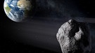 Ein Asteroid vor der Erde (Illustration) | Bild: ESA